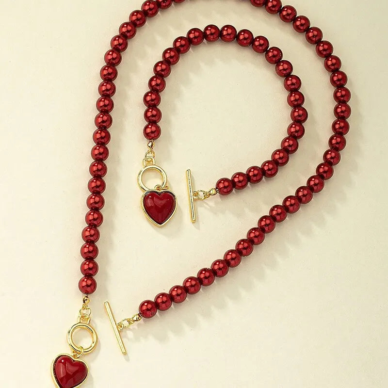 Conjunto de Pendente de Contas com Coração e Pulseira