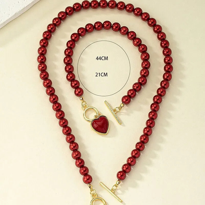 Conjunto de Pendente de Contas com Coração e Pulseira