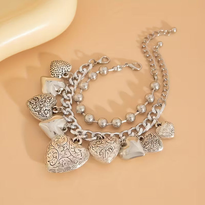 Conjunto de 2 Braceletes Rígidas Coração Abundante