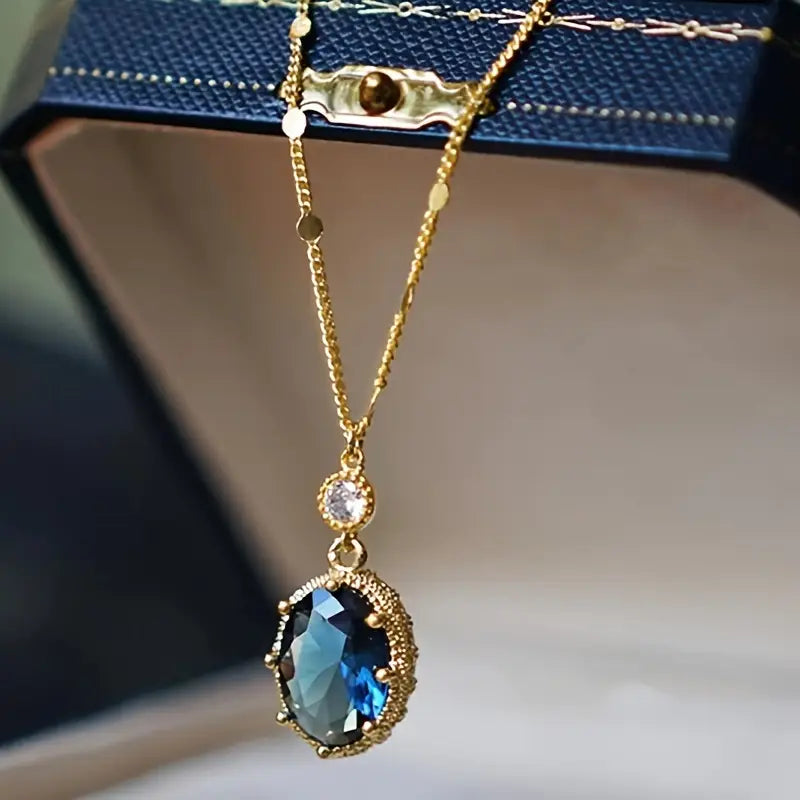 Colar Dourado com Safira Oval