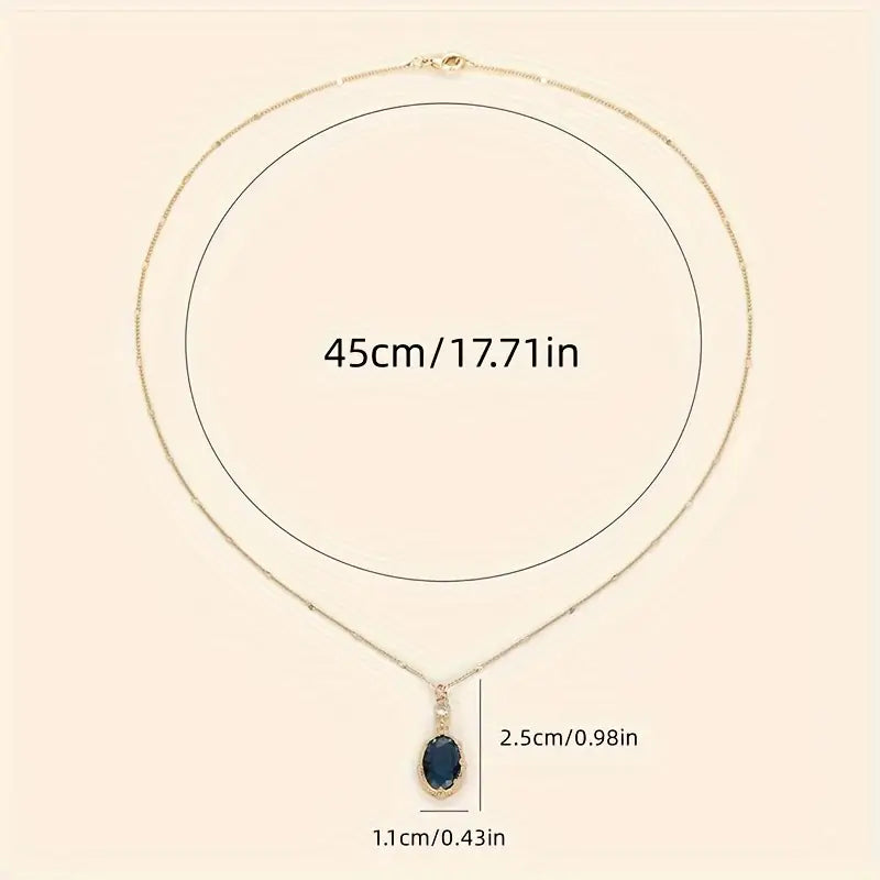Colar Dourado com Safira Oval