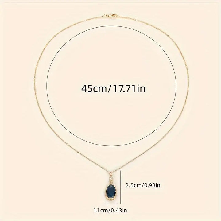 Colar Dourado com Safira Oval