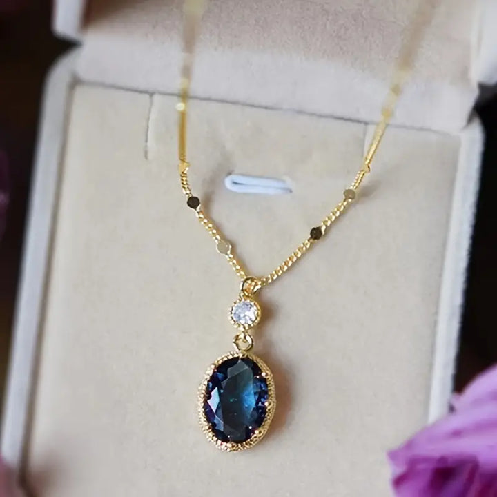 Colar Dourado com Safira Oval