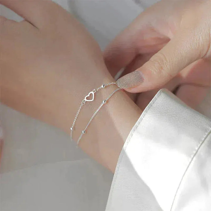 Pulseira Prateada com Coração e Comprimento Ajustável
