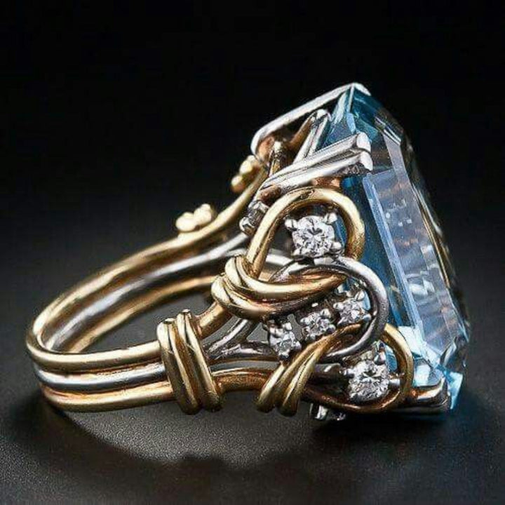 Anel Vintage Dourado em Camadas com Zircónias Azuis