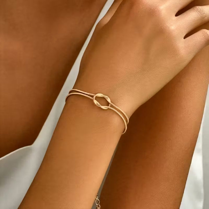 Pulseira Dourada com Laço