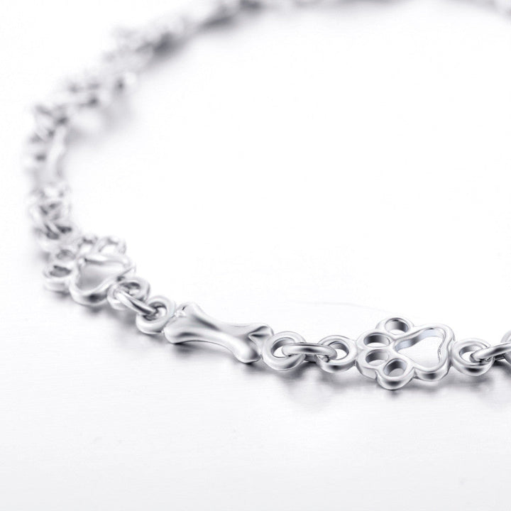 Edição Limitada: Pulseira em Prata de Lei com Pendentes de Pata e Osso