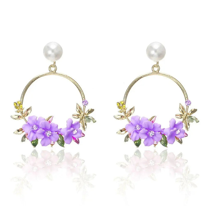 Brincos Dourados com Flor e Pérola