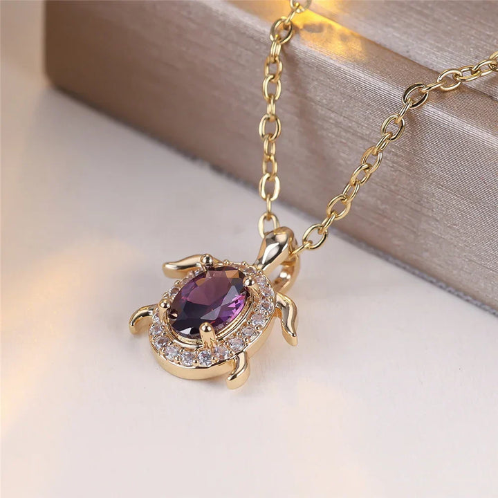 Colar com Tartaruga de Cristal Roxo