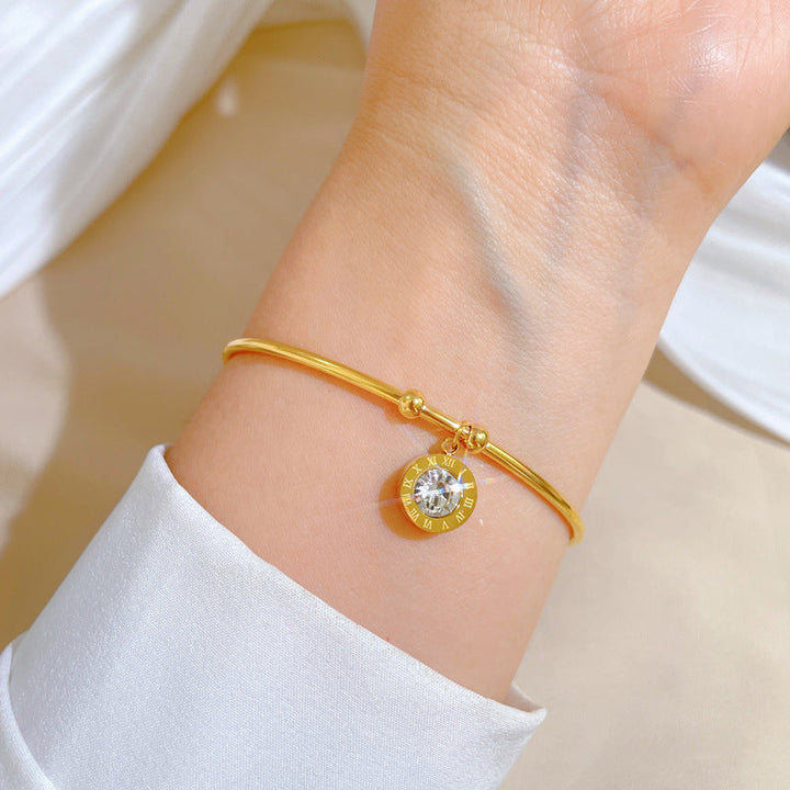 Bracelete Rígida Dourada Chromia com Cristais