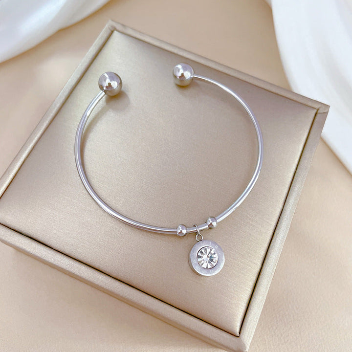 Bracelete Rígida Dourada Chromia com Cristais