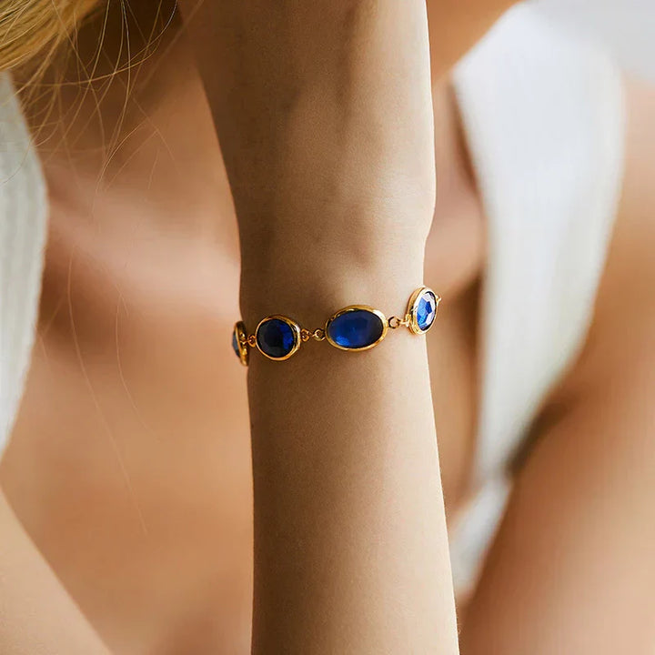 Pulseira Dourada Brilhante com Safira