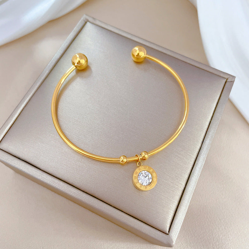 Bracelete Rígida Dourada Chromia com Cristais