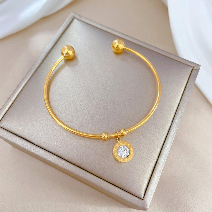 Bracelete Rígida Dourada Chromia com Cristais