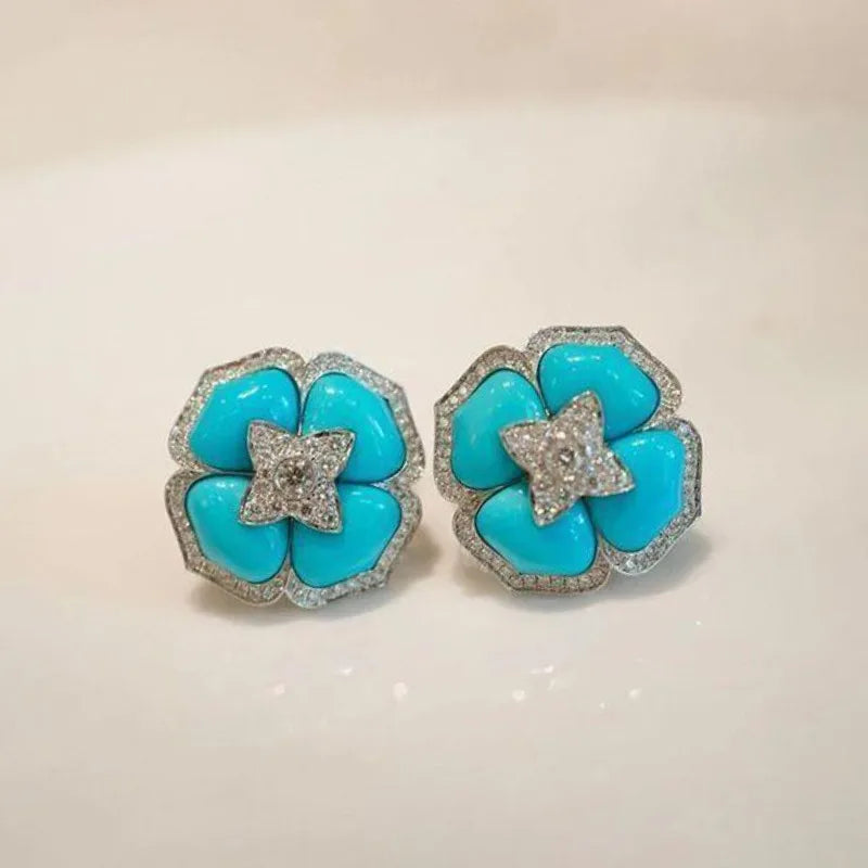 Brincos Prateados Sofisticados com Flor Azul