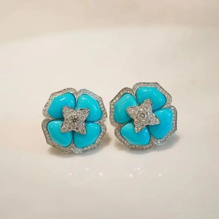 Brincos Prateados Sofisticados com Flor Azul