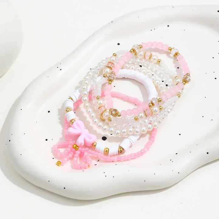 Conjunto de Pulseiras de Pérolas com Laço Amor