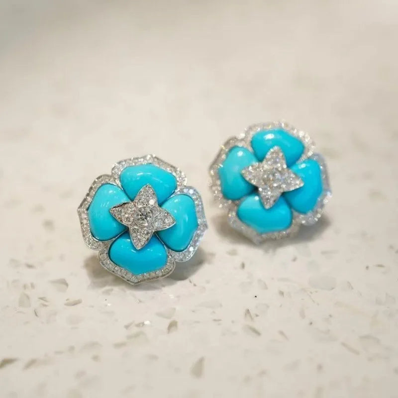 Brincos Prateados Sofisticados com Flor Azul