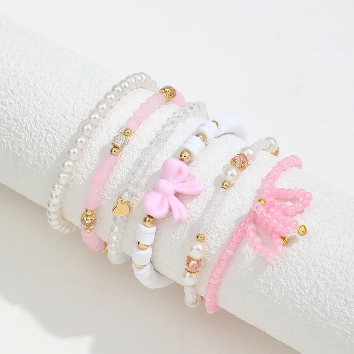 Conjunto de Pulseiras de Pérolas com Laço Amor