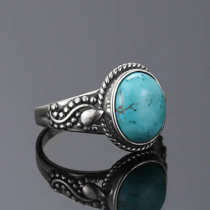 Anel Prateado Intemporal com Turquesa Oval