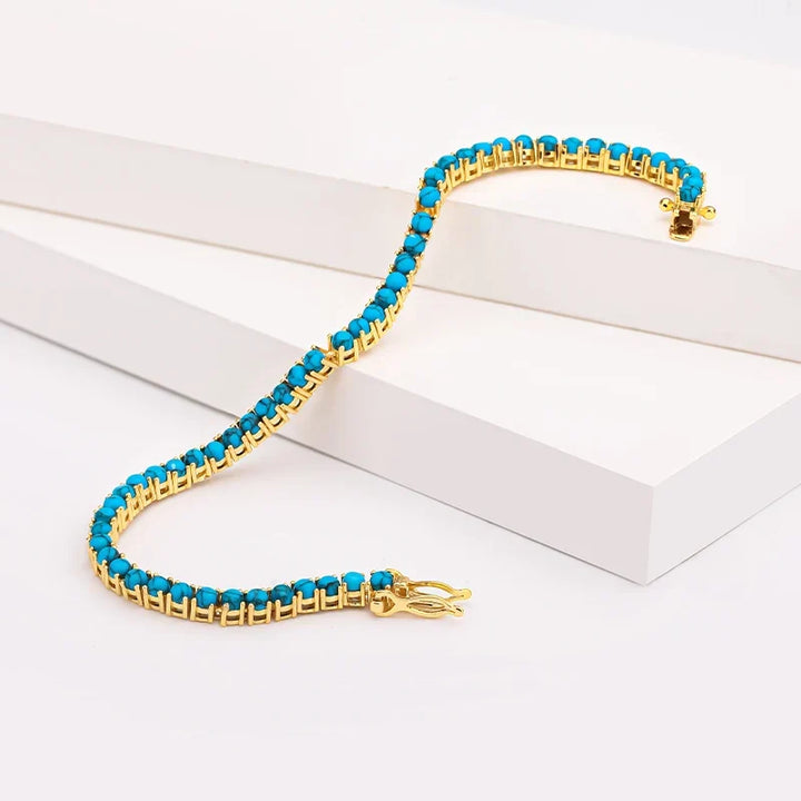 Pulseira de corrente dourada elegante com turquesa