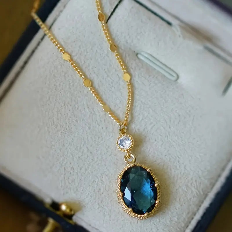 Colar Dourado com Safira Oval