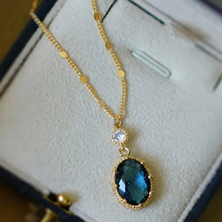 Colar Dourado com Safira Oval