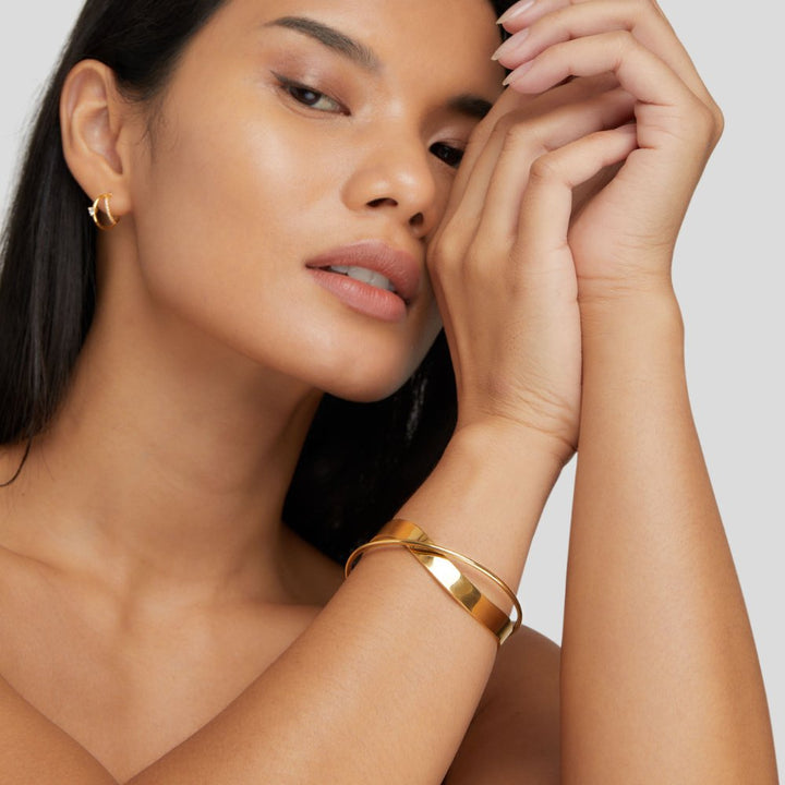Bracelete Rígida Dourada Única Eve