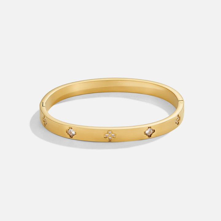 Bracelete Rígida Dourada com Trevo de Quatro Folhas