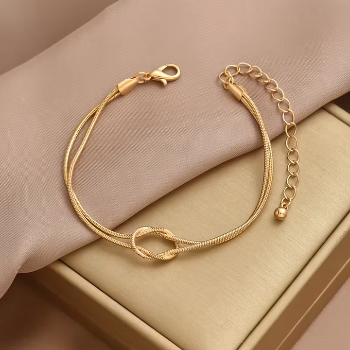 Pulseira Dourada com Laço