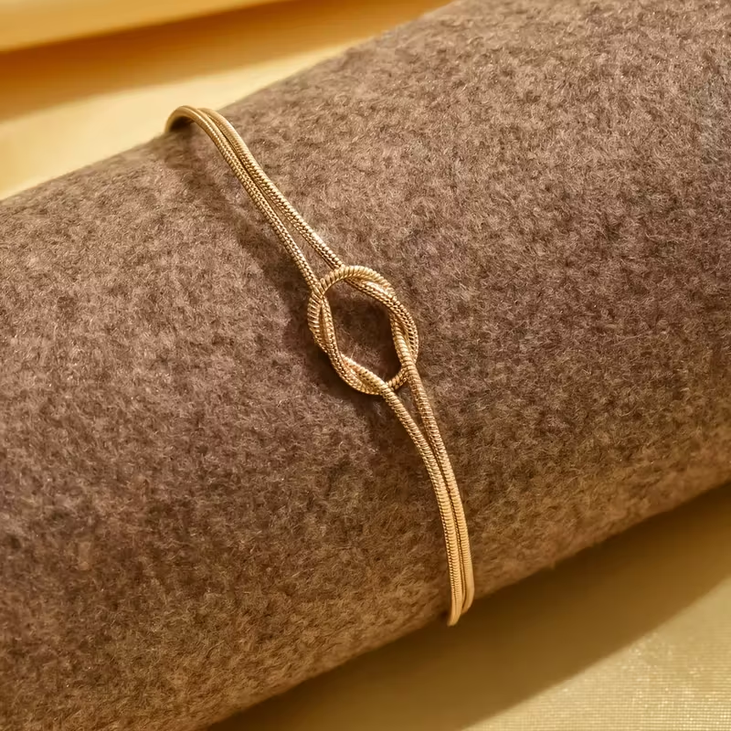 Pulseira Dourada com Laço