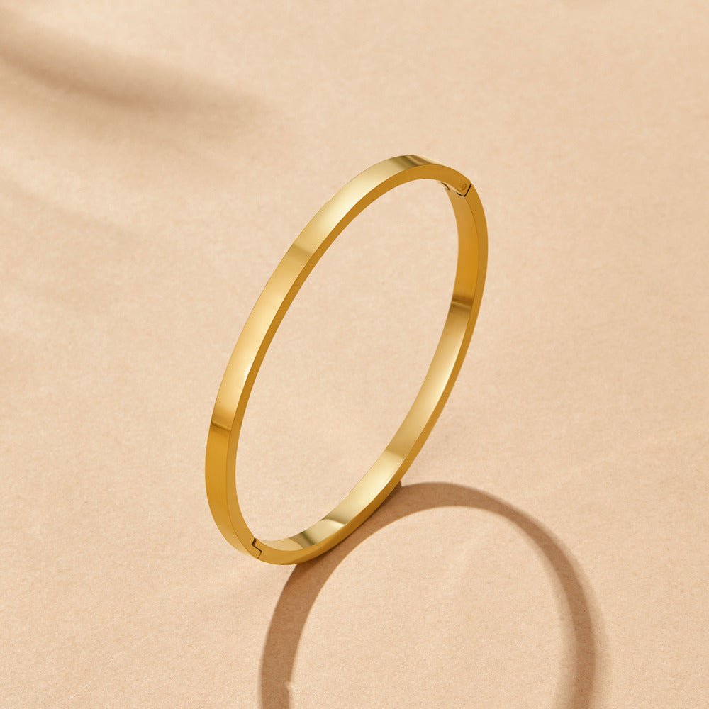 Bracelete Rígida Dourada Rina